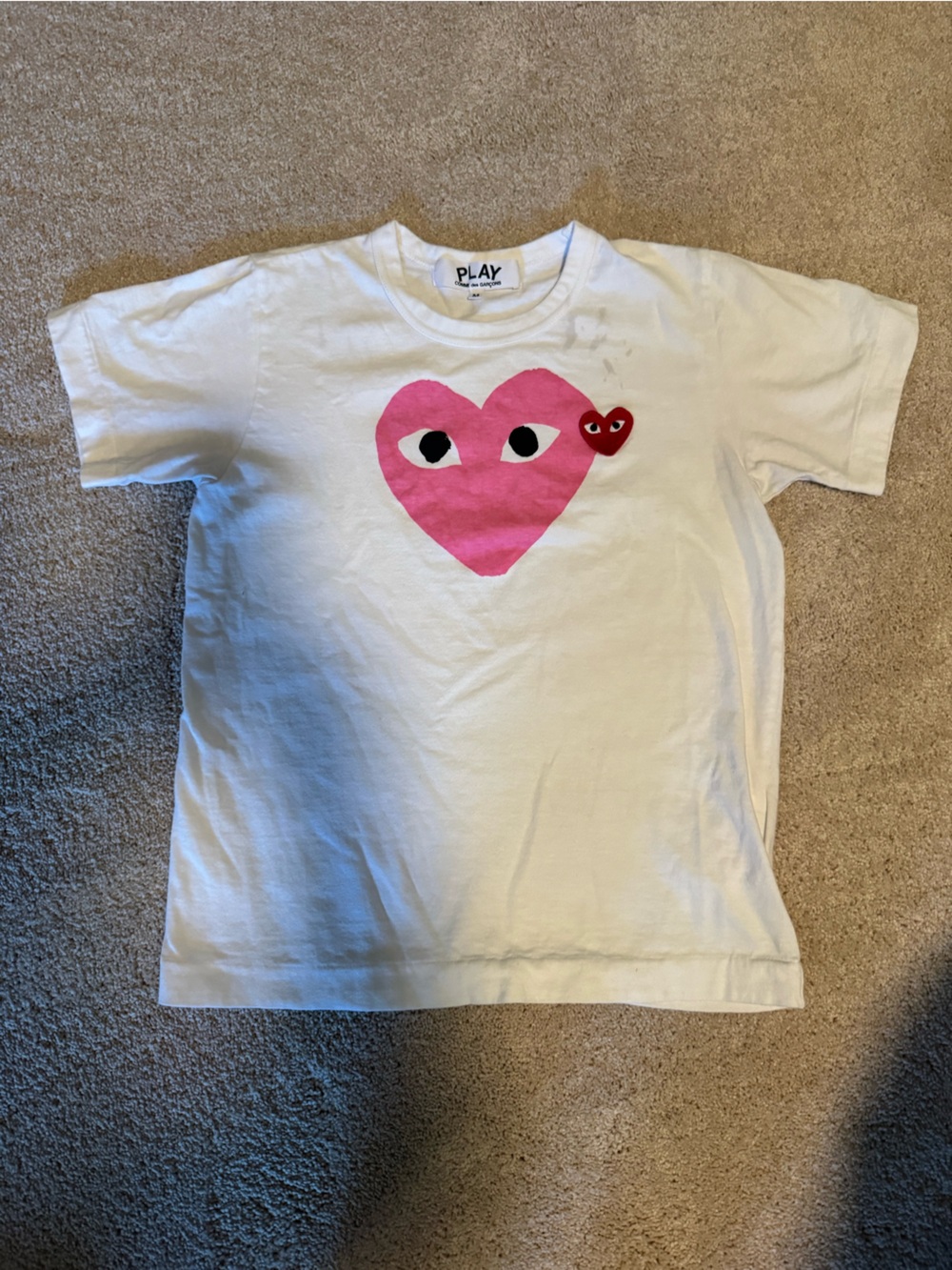 Comme Des Garçon White Tee with Pink Heart Eyes Graphic